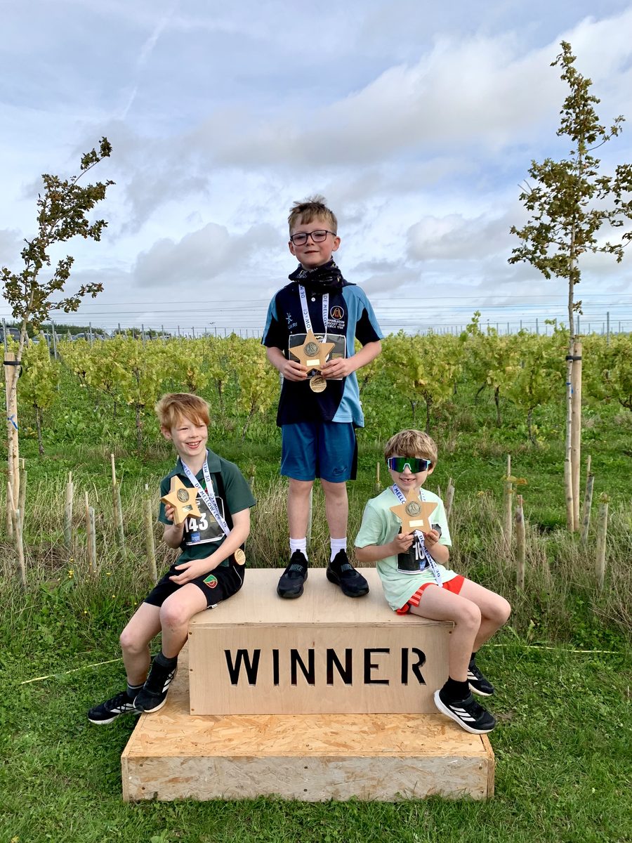 1km boys podium