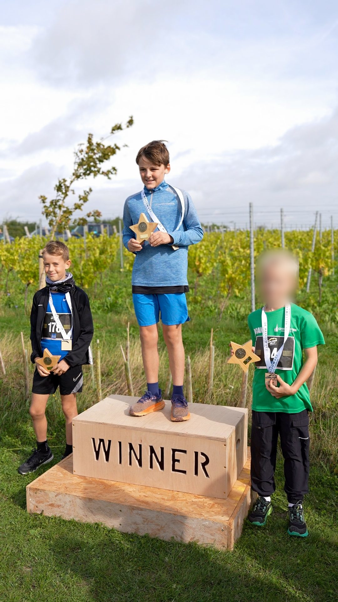 2km boys podium